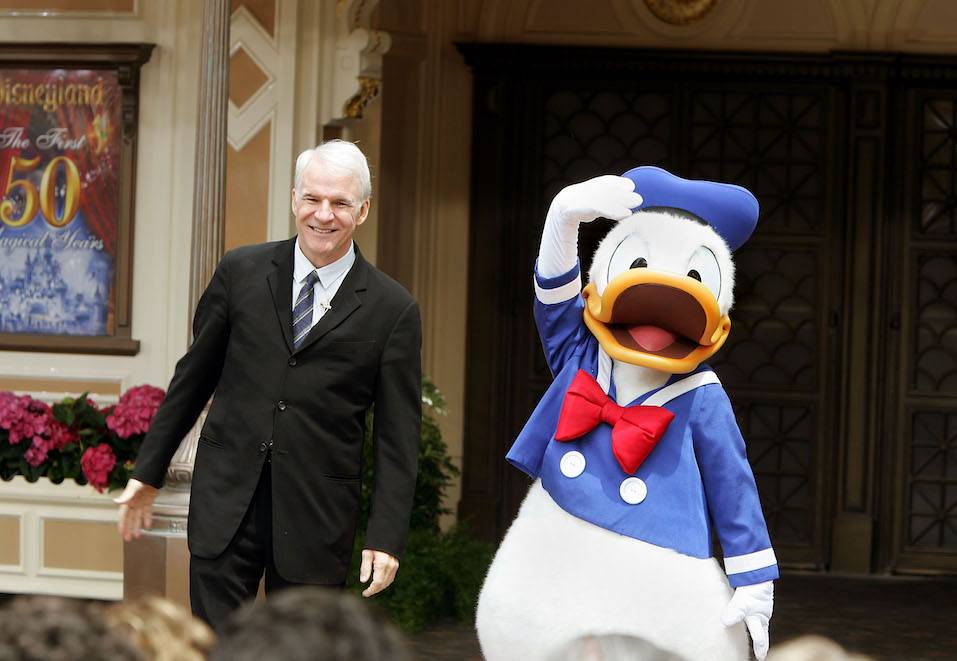 Donald Duck and former Disneyland cast member, actor Steve Martin unveil "Disneyland