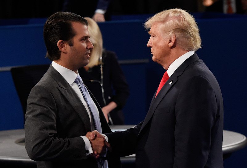 Donald Trump shaking his son, Donald Trump Jr's hand. Donald Trump shaking his son, Donald Trump Jr's hand.