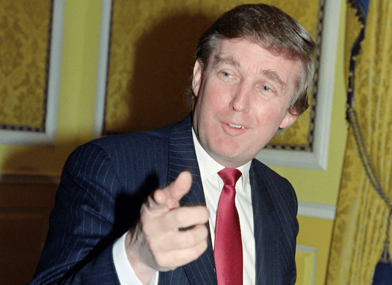 A younger Donald Trump pointing at someone. 