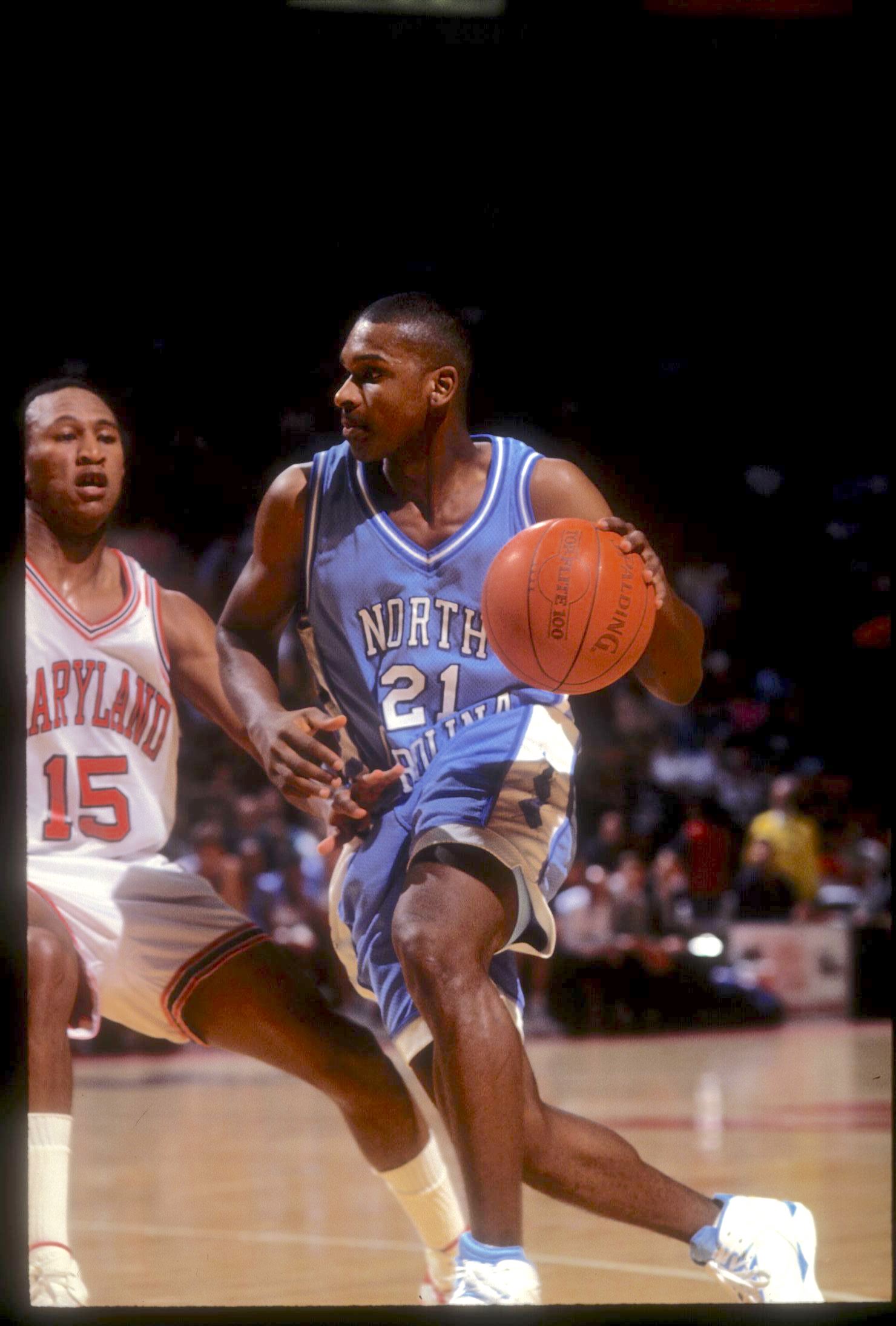Donald Williams dribbles past a defender