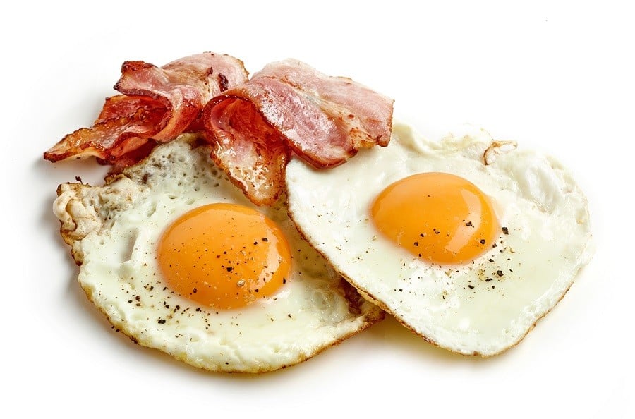 fried eggs and bacon slices