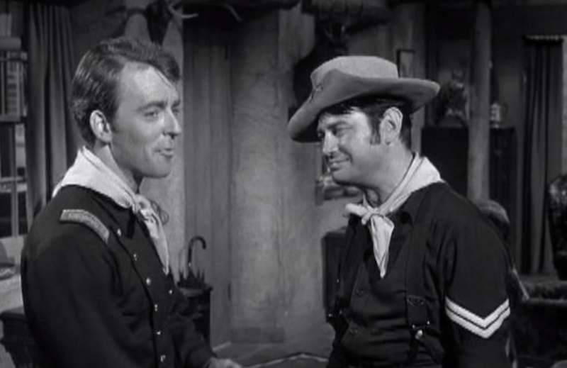 Two men speaking to each other on 'F-Troop'. Two men speaking to each other on 'F-Troop'.