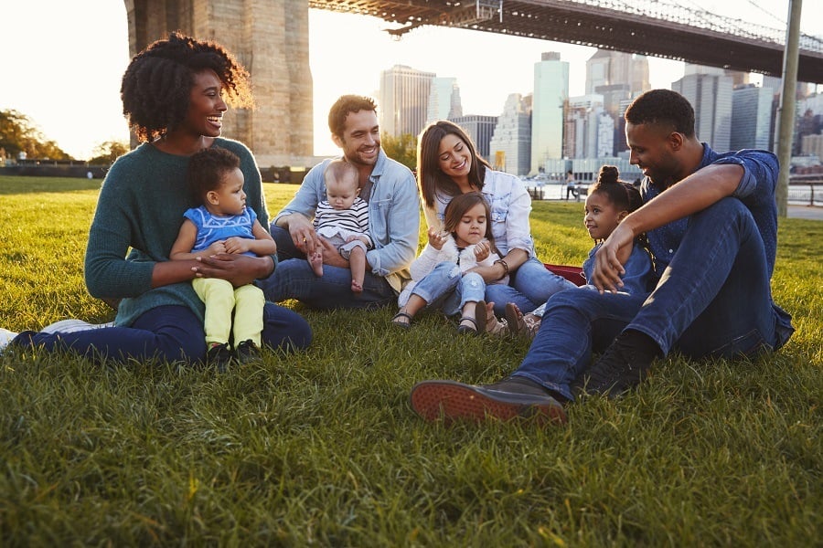 Family sitting in lawn Family sitting in lawn