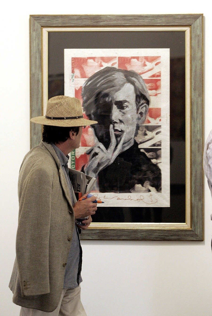 man looking at the painting man looking at the painting