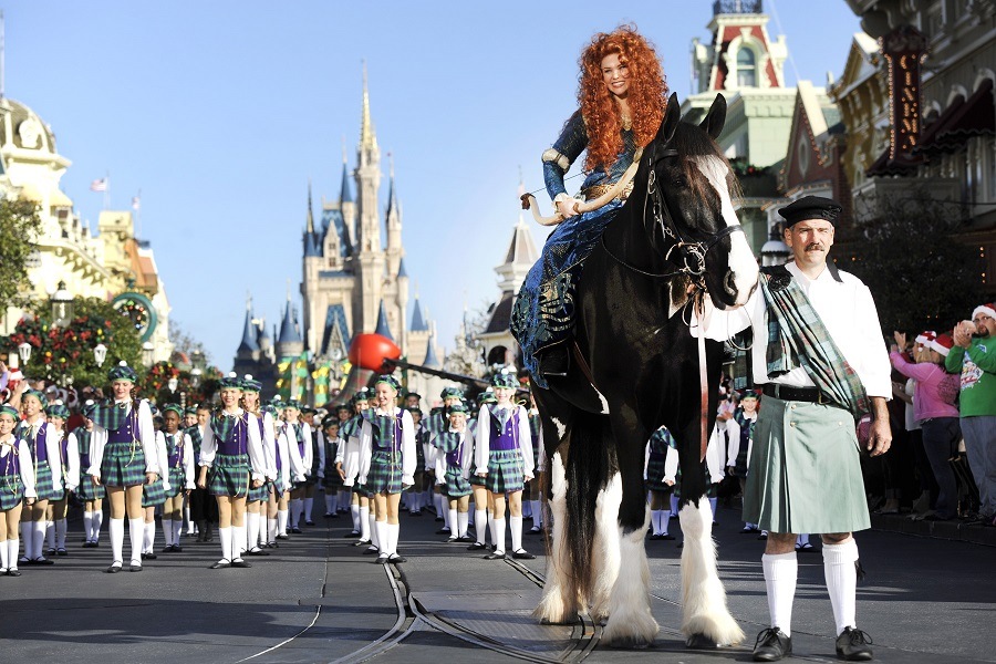 Feeding-the-animals Disney parade with a horse