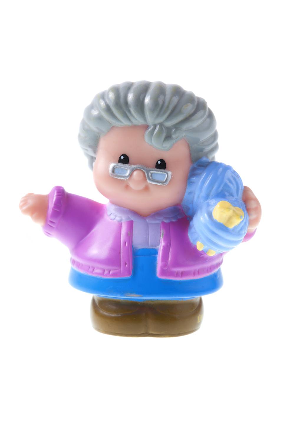 A studio shot of a Fisher Price Little People Grand Mother