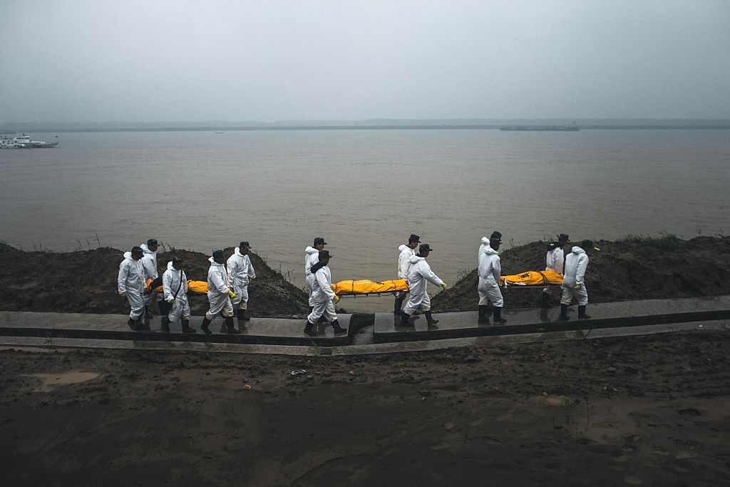 Chinese cruise ship walking on the riverbank in Jianli, central China's Hubei province. Chinese cruise ship walking on the riverbank in Jianli, central China's Hubei province.