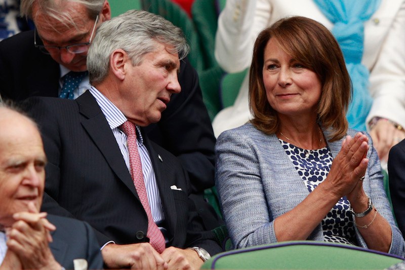 LONDON, ENGLAND - JUNE 30: The Parents of Kate Middleton, Michael and Carole Middleton are in conversation as they watch on from the stands in centre court on day four of the Wimbledon Lawn Tennis Championships at the All England Lawn Tennis and Croquet Club on June 30, 2016 in London, England. (Photo by Adam Pretty/Getty Images)