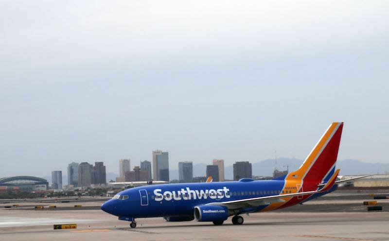 A Southwest airline plane is seen on the tarmac at Phoenix Sky Harbor International Airport on September 19, 2016 in Phoenix, Arizona. / AFP / Daniel SLIM (Photo credit should read DANIEL SLIM/AFP/Getty Images)