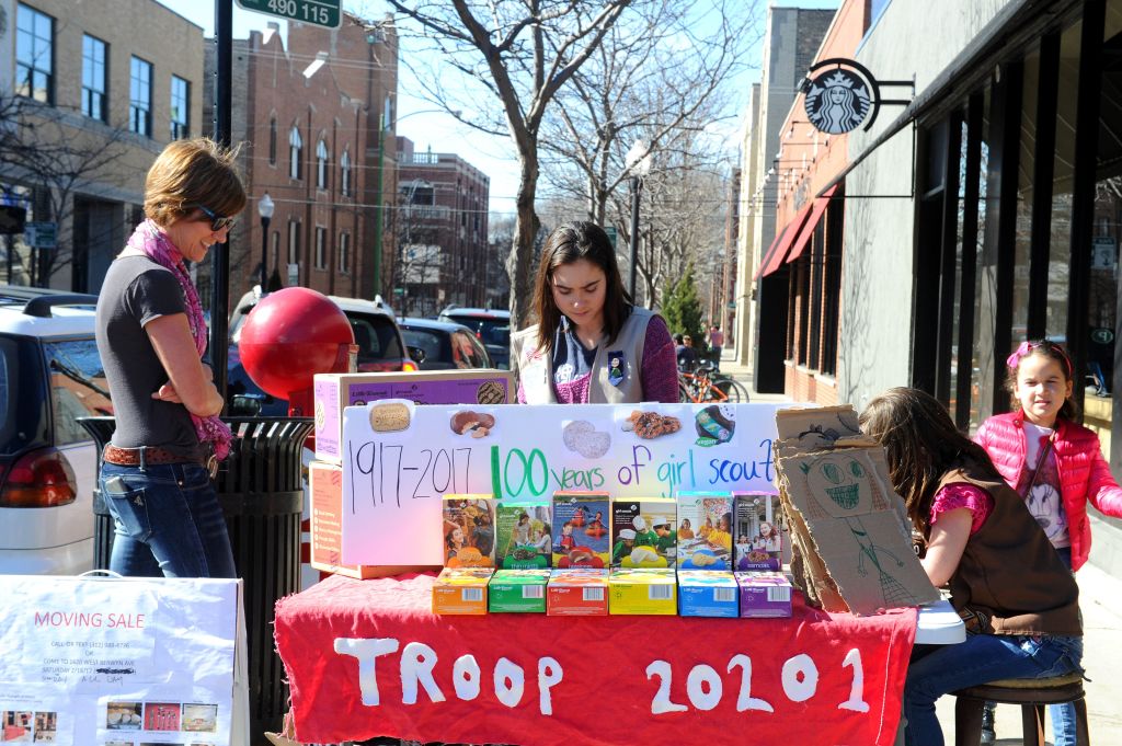 Girl Scouts selling cookies