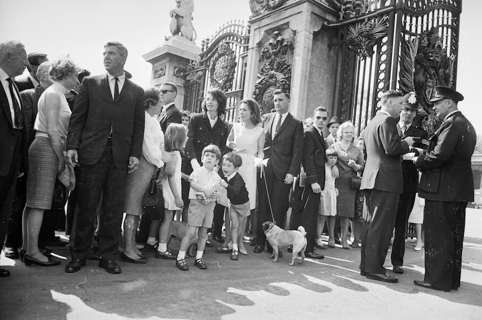 Jackie Kennedy, widow of president John F. Kennedy, standing outside Buckingham Palace