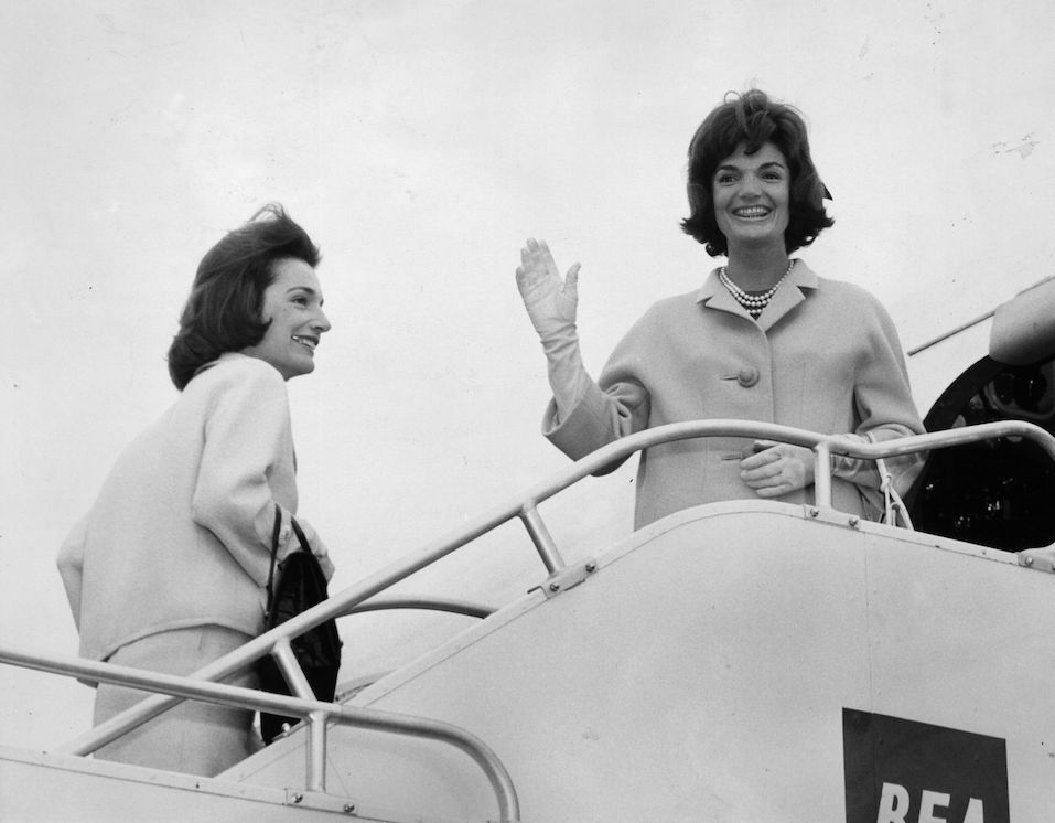 Jackie Kennedy (1929 - 1994), wife of president John F Kennedy, boards a BEA aeroplane at London airport