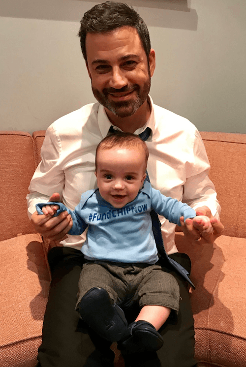 Jimmy Kimmel holding his son. Jimmy Kimmel holding his son.
