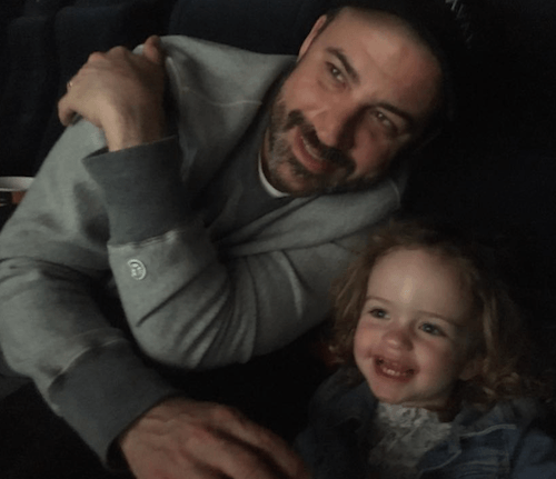 Jimmy Kimmel and his daughter watching a movie. Jimmy Kimmel and his daughter watching a movie.