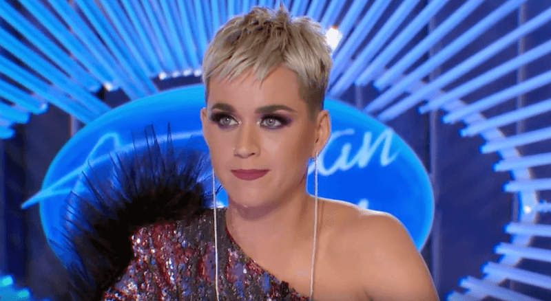 Katy Perry sitting at the judge's desk on 'American Idol'.