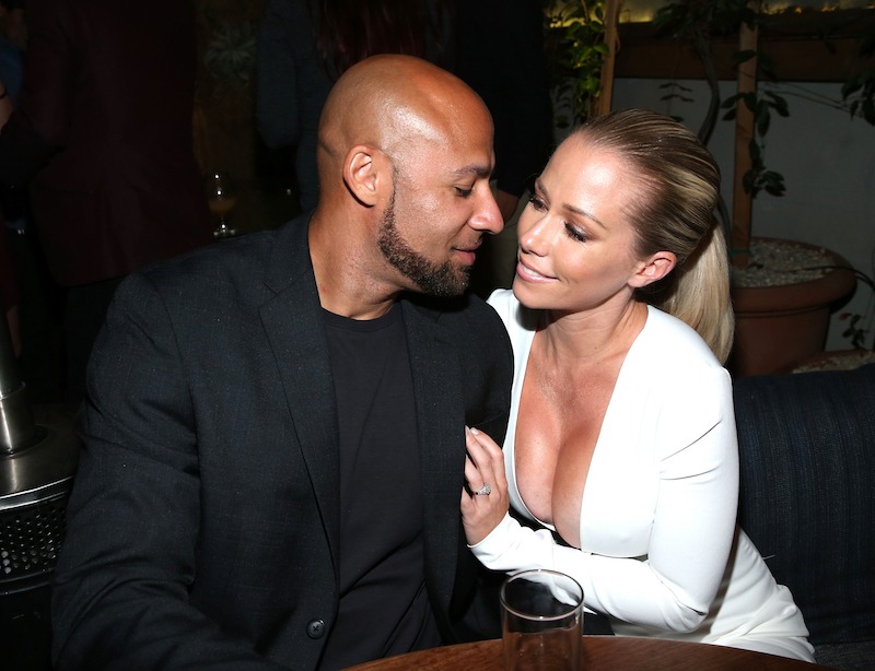 Kendra Wilkinson and Hank Baskett together at a party. Kendra Wilkinson and Hank Baskett together at a party.