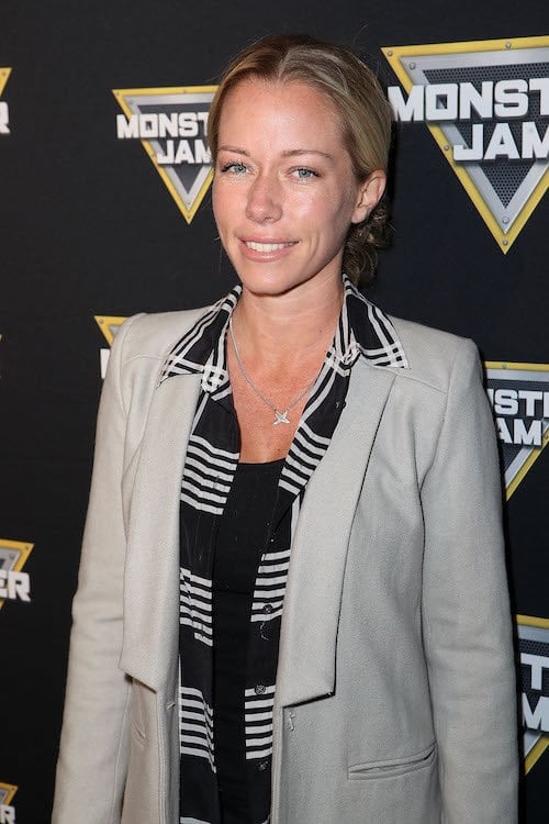 Kendra Wilkinson Baskett posing on a red carpet. Kendra Wilkinson Baskett posing on a red carpet.