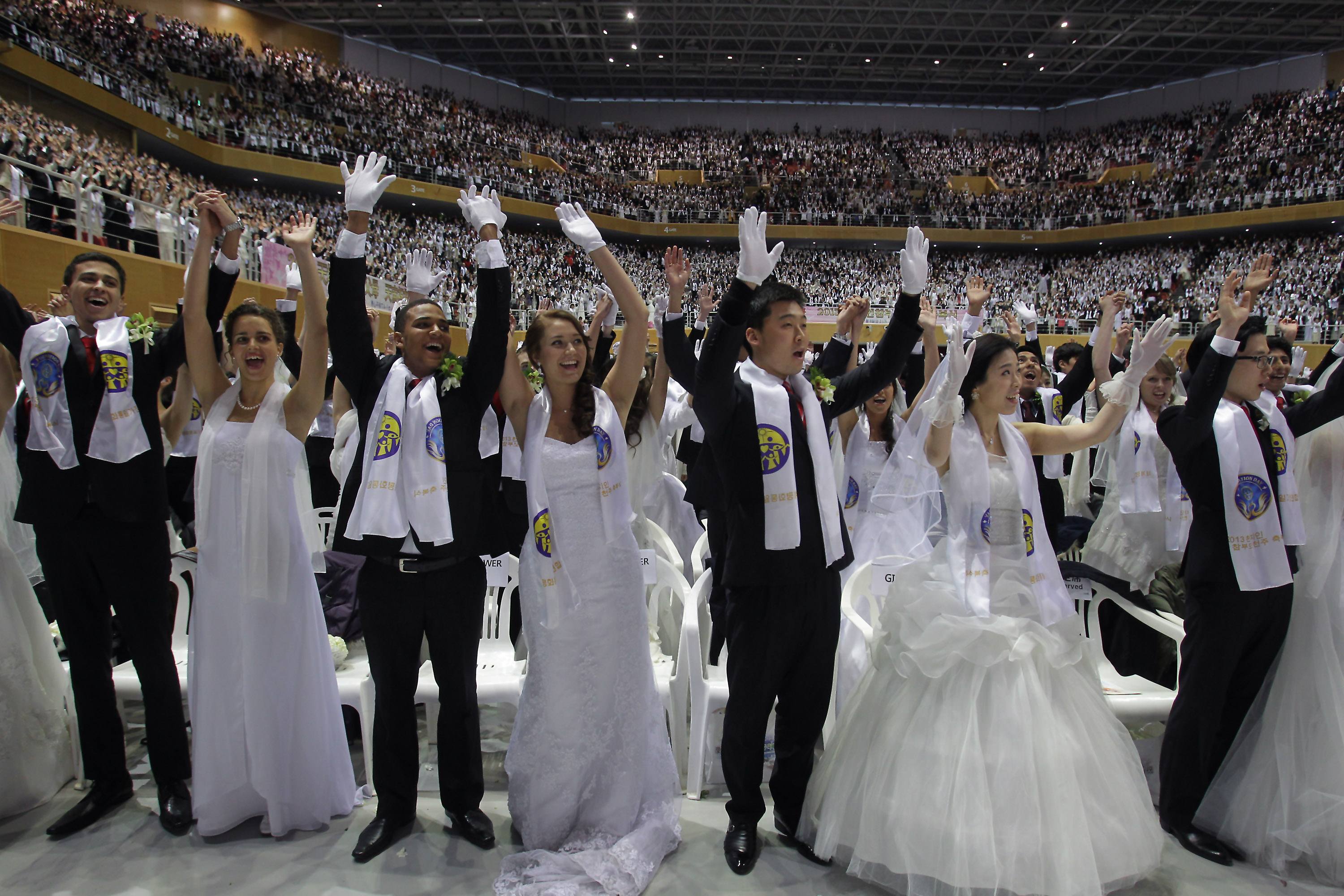 Unification Church Holds Mass Wedding