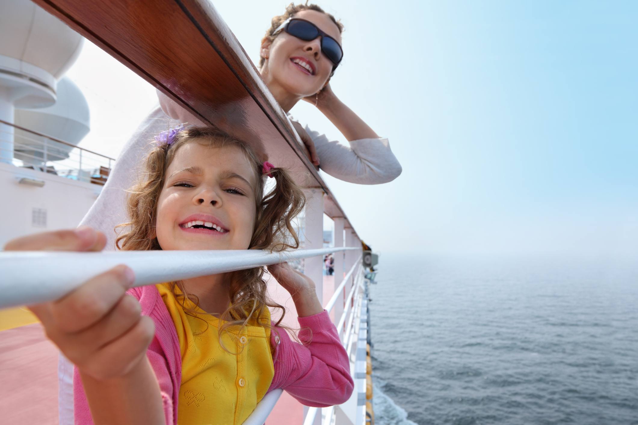 Mother and daughter traveling on cruise ship