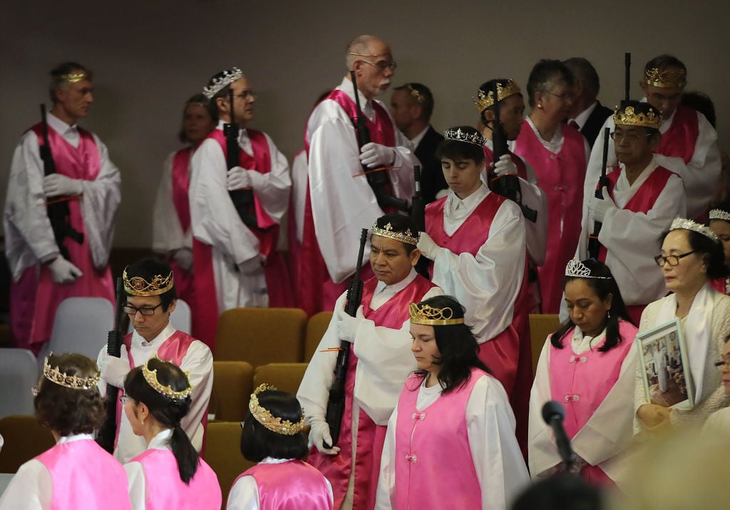 World Peace And Unification Sanctuary Religious Group Holds Blessing Ceremony For Couples And Their AR-15 Rifles