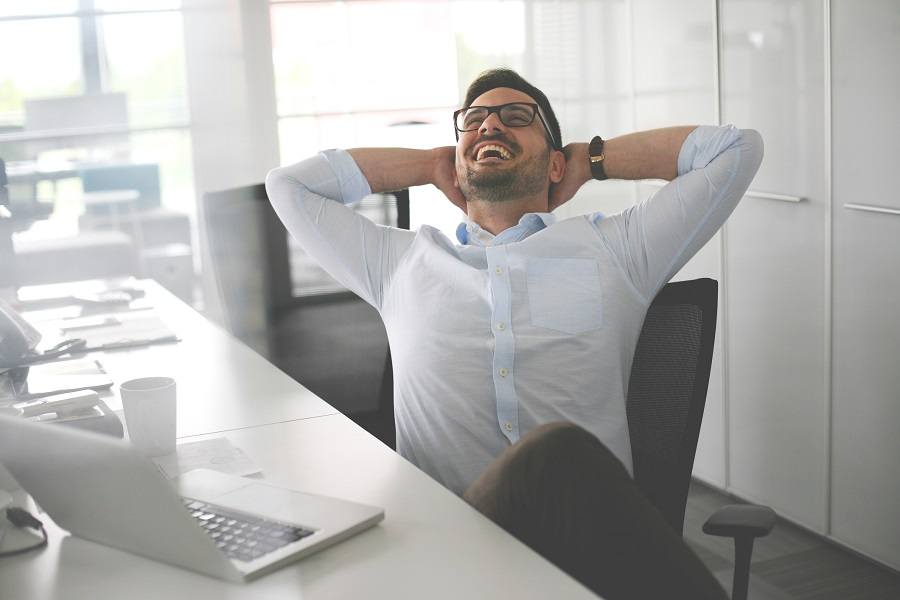 Man in office relaxing