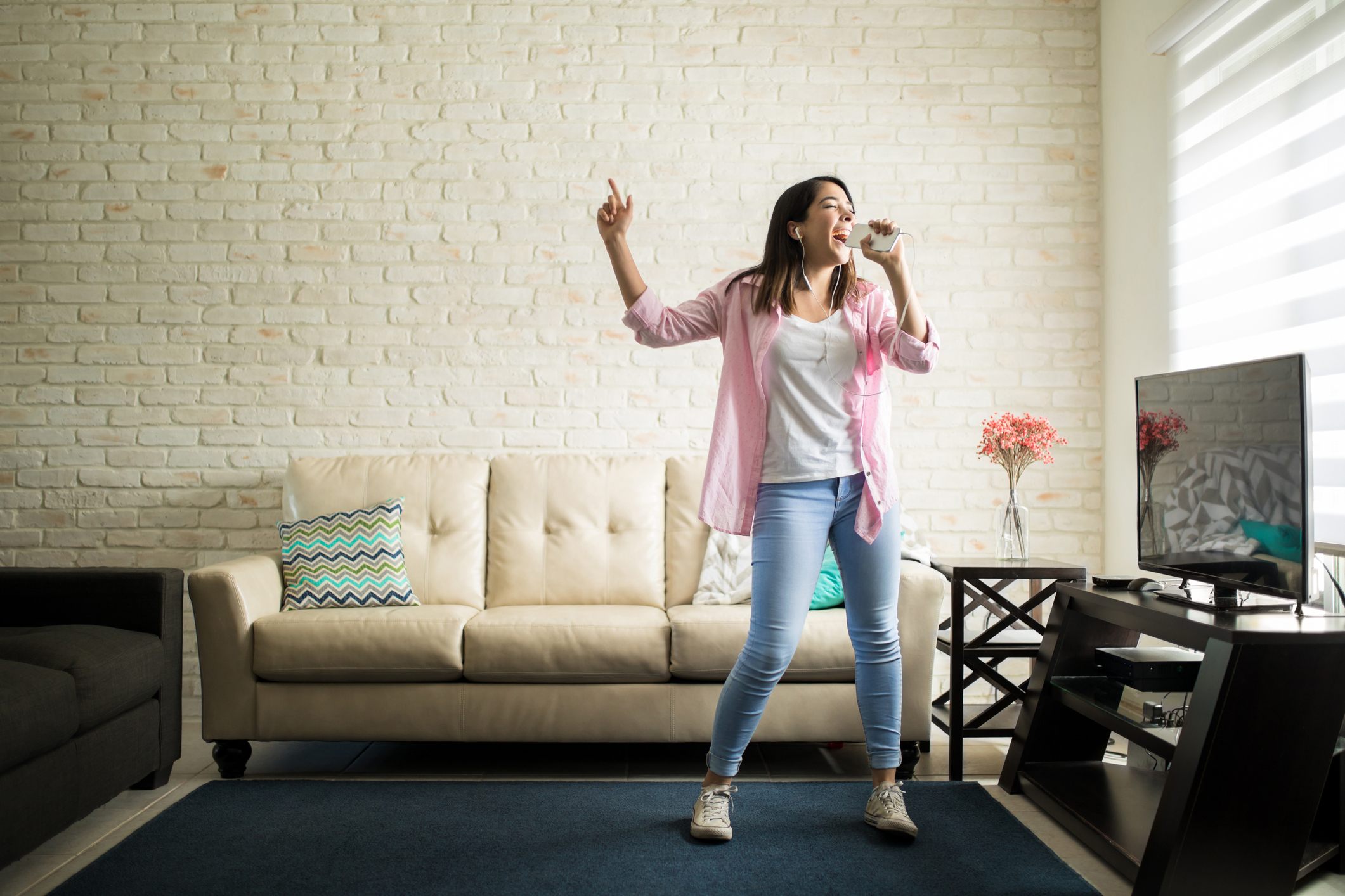 Woman singing at home Woman singing at home