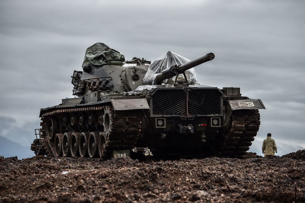 A Turkish tank is stationed near the Syrian border at Hassa