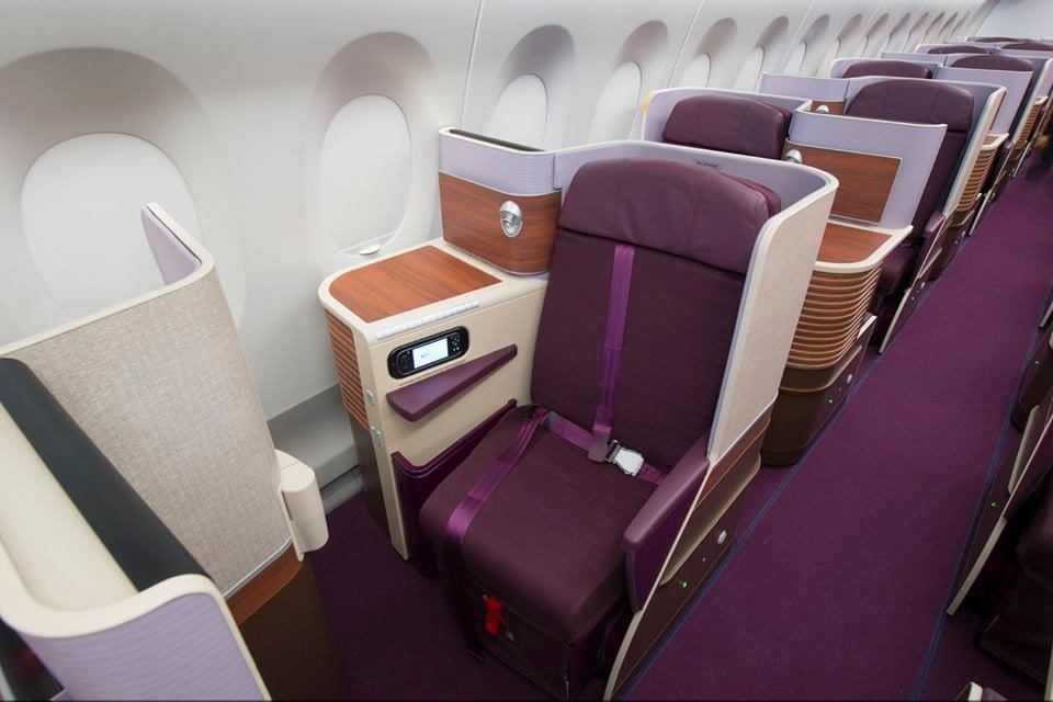 Purple seats in the Thai airways first class section.