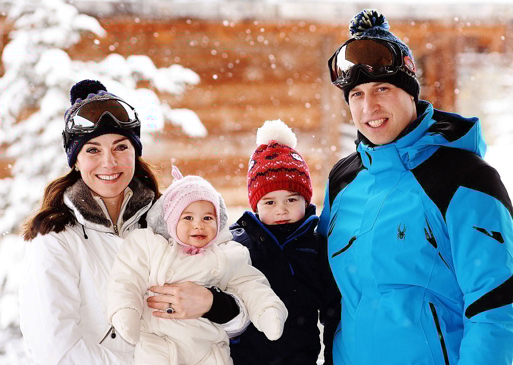 Catherine, Duchess of Cambridge and Prince William, Duke of Cambridge, with their children, Princess Charlotte and Prince George, enjoy a short private skiing