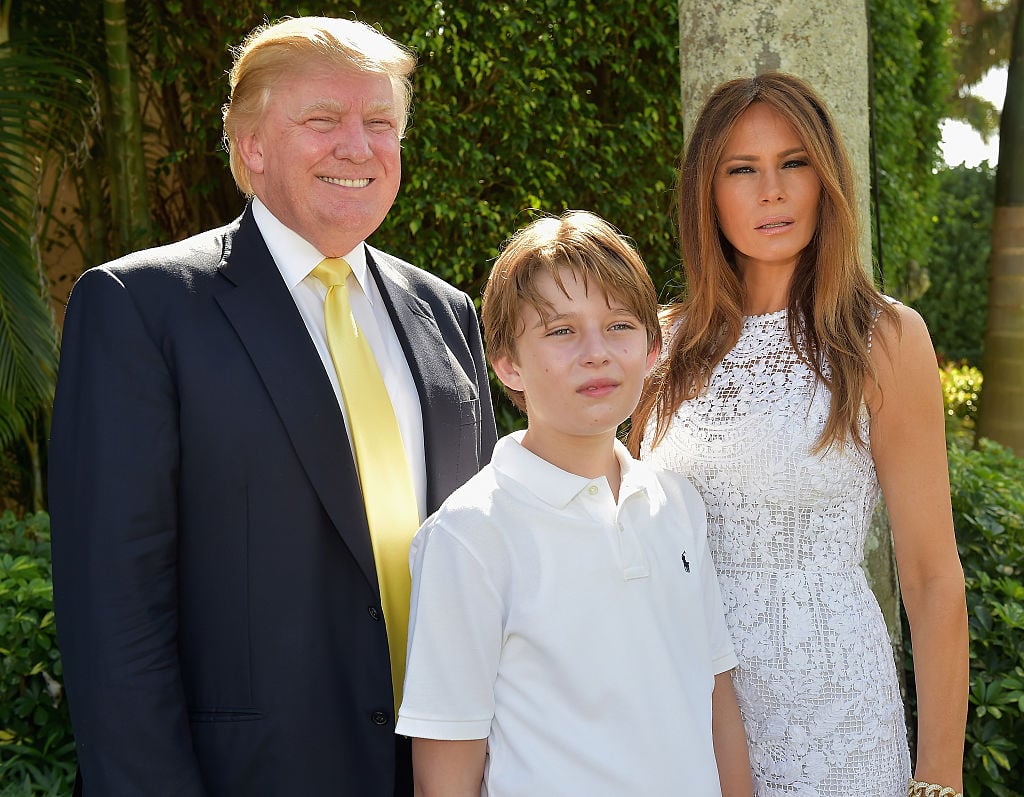 Donald Trump, Barron Trump and Melania Trump attends Trump Invitational Grand Prix Mar-a-Lago Club