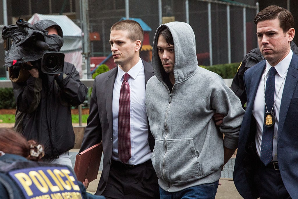 Martin Shkreli CEO of Turing Pharmaceutical, is brought out of 26 Federal Plaza by law enforcement officials after being arrested for securities fraud