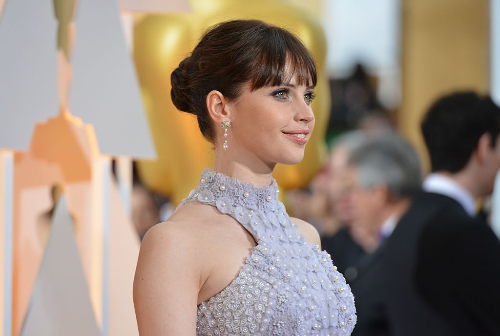 Nominee for Best Actress Felicity Jones arrives on the red carpet for the 87th Oscars