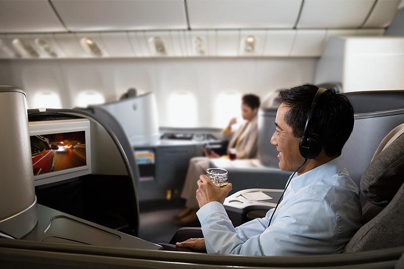 Man watching a movie in United Polaris first class