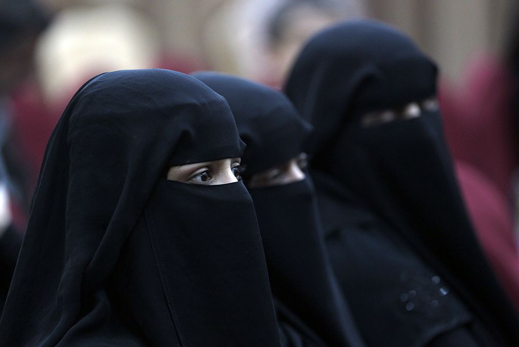 Women wearing Niqabs attend movie screening