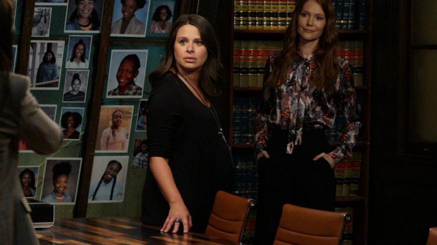 Katie Lowes as Quinn Perkins and Darby Stanchfield as Abby Whelan on Scandal