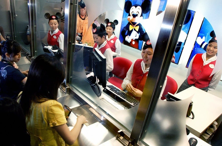 People buy the first tickets for the new Hong Kong Disneyland People buy the first tickets for the new Hong Kong Disneyland