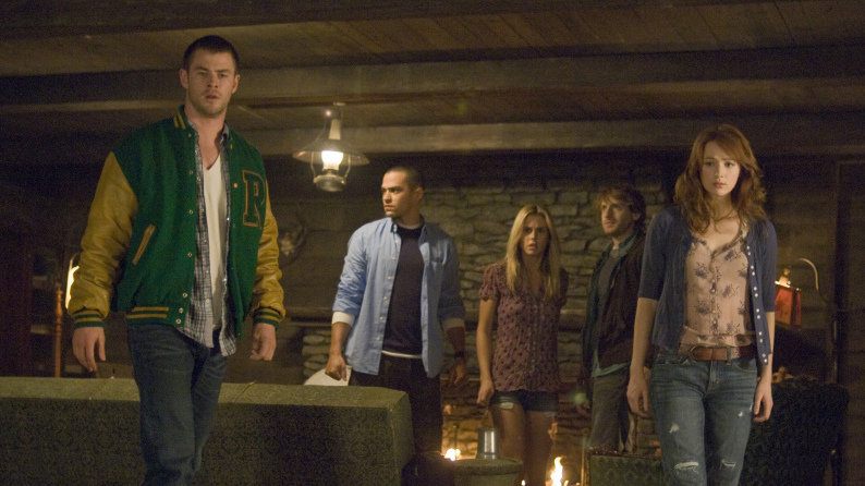 A group of teens in a cabin A group of teens in a cabin