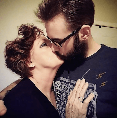 The couple kissing in a photograph. The couple kissing in a photograph.