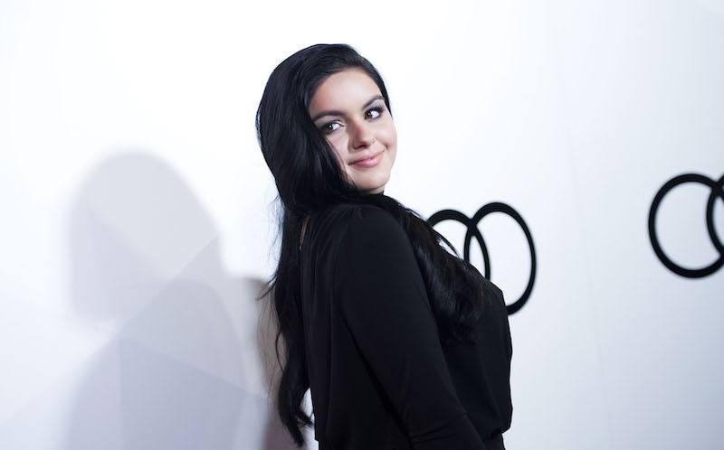 Ariel Winter posing on a red carpet. Ariel Winter posing on a red carpet.