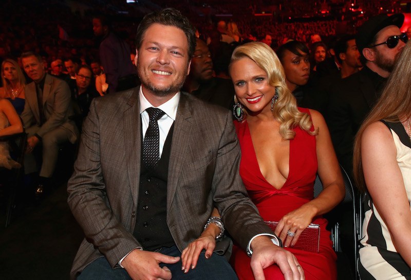 Blake Shelton and Miranda Lambert sitting together at an awards show. 