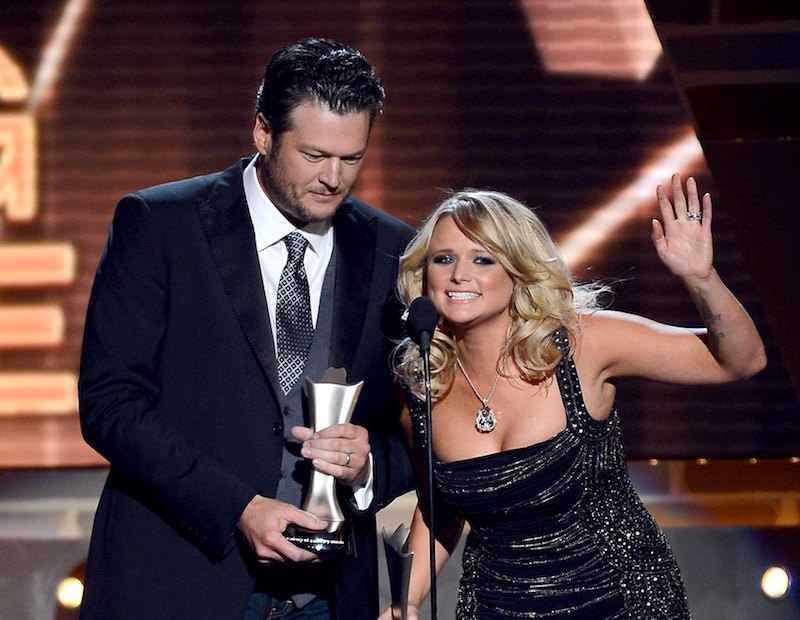 Blake Shelton and Miranda Lambert on stage together. Blake Shelton and Miranda Lambert on stage together.
