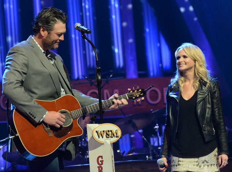 Blake Shelton and Miranda Lambert performing on stage. Blake Shelton and Miranda Lambert performing on stage.