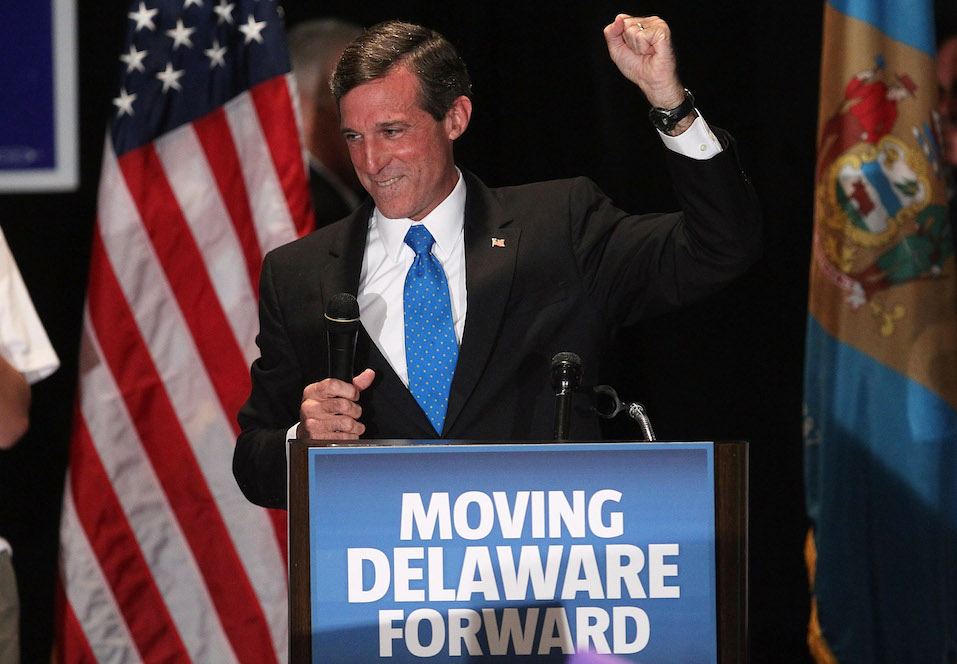Representative-elect John Carney celebrates his win during a victory party