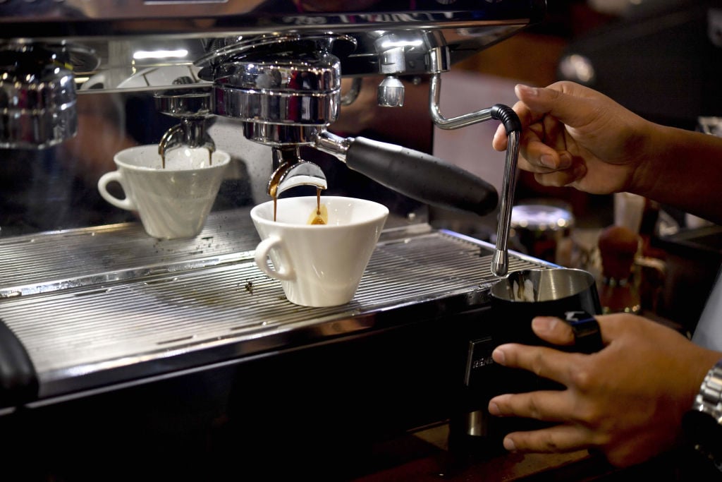 Baristo making coffee Barista making coffee