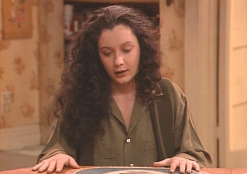 Darlene sitting in the kitchen table. Darlene sitting in the kitchen table.