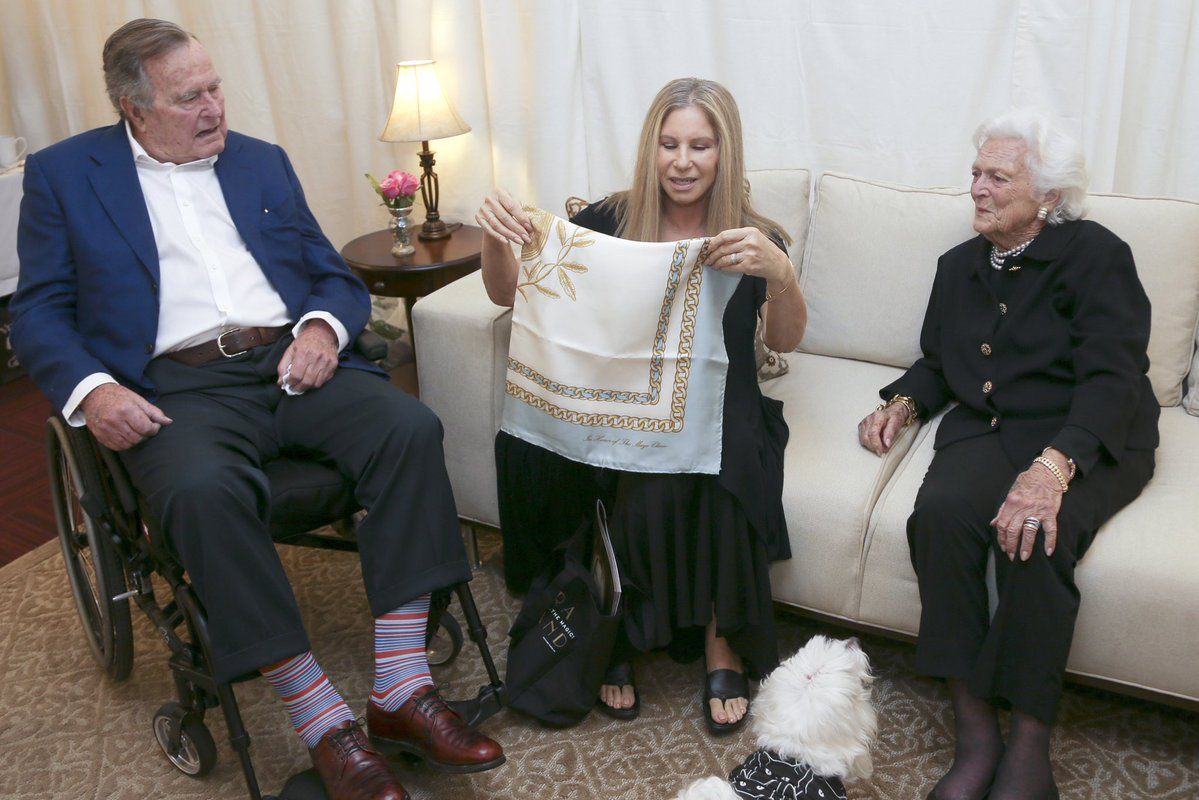 Barbra Stresiand and George and Barbara bush