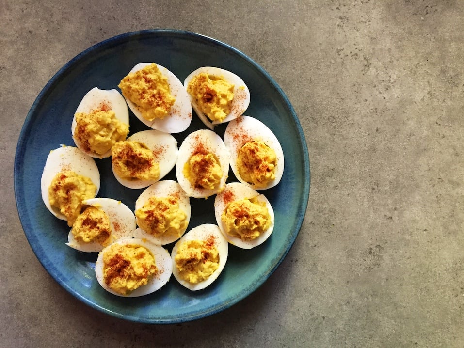 Devilled eggs on blue plate