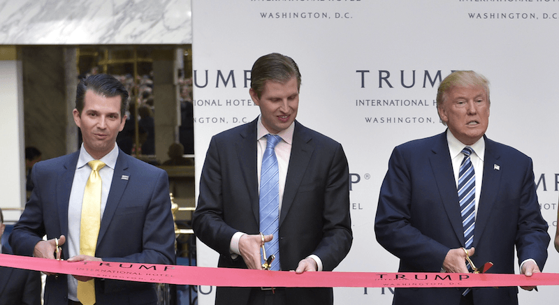 At a tower opening: Donald Trump Jr., Eric Trump, and Donald Trump