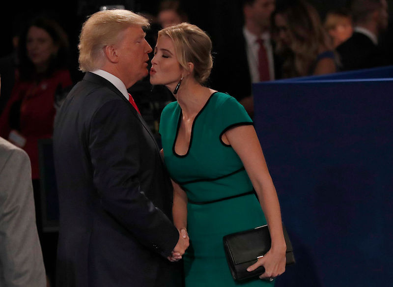 Ivanka Trump kissing her father. 