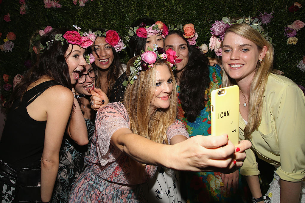Drew Barrymore with fans at beautycon